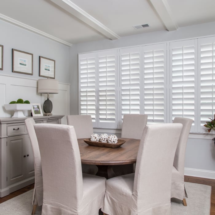 White painted shutters in a dining room