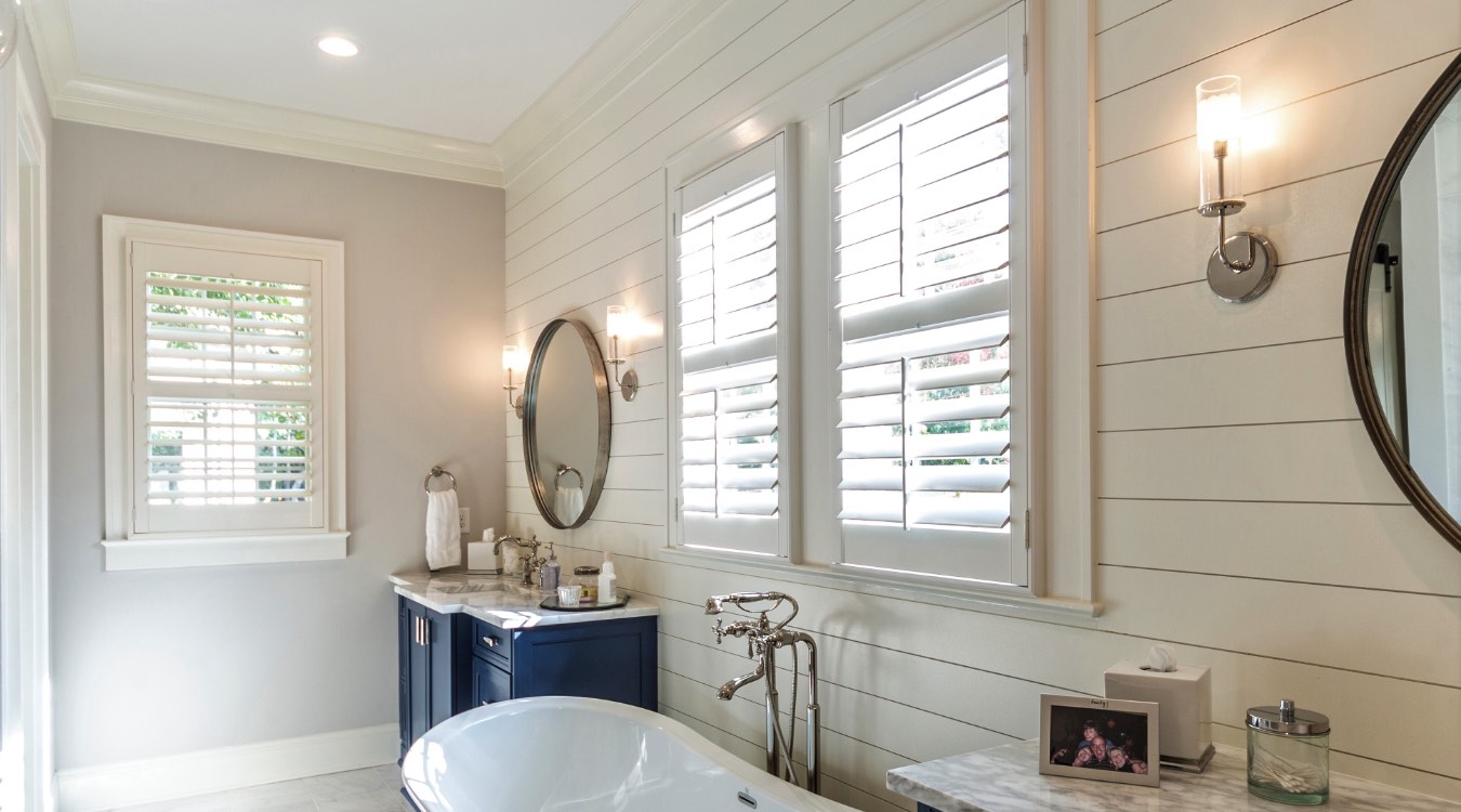 Salt Lake City bathroom with white plantation shutters.