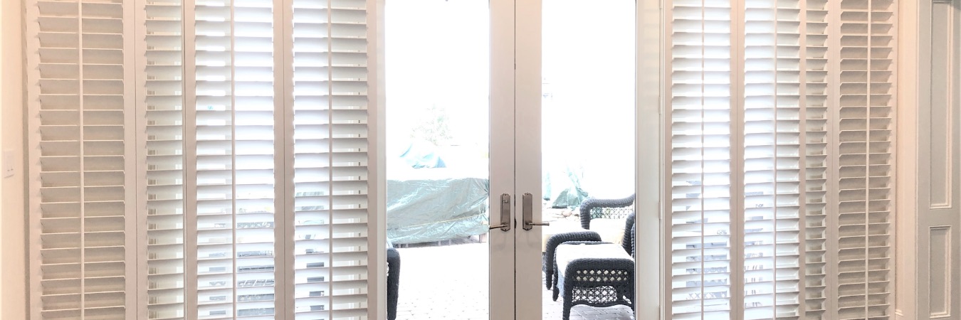 Plantation shutters on a sliding door