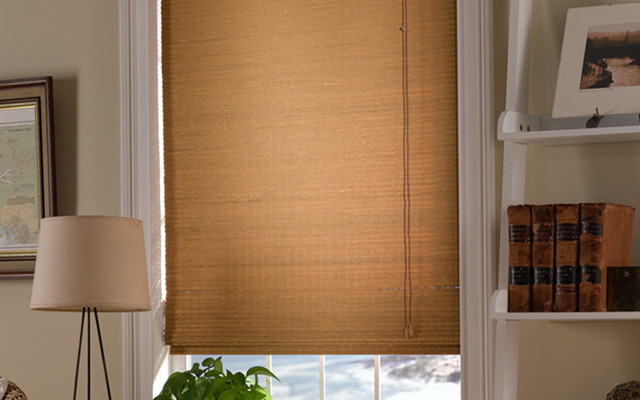 Add a touch of nature to your decor with woven fiber shades in Salt Lake City. Tan woven fiber shades in a living room