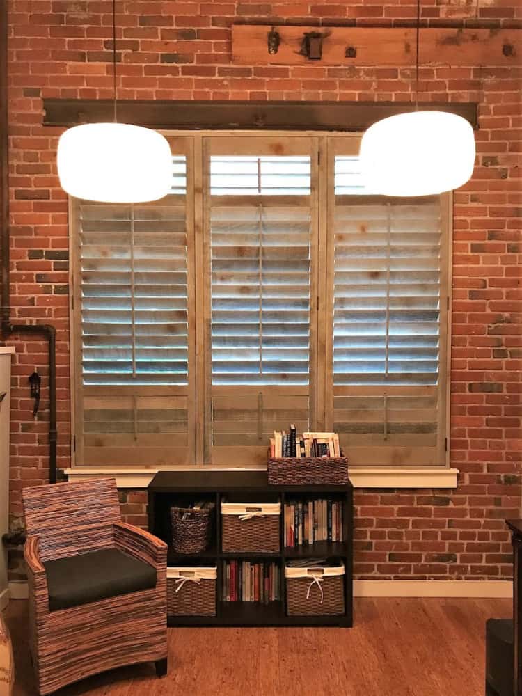 Reclaimed Wood Against Brick