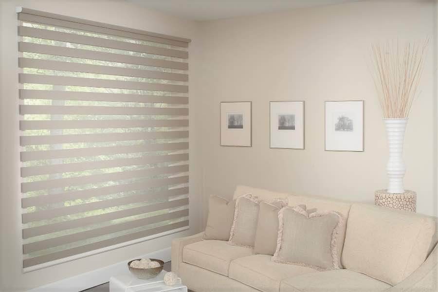 Zebra shades give you a unique combination of light control and style that benefits your Salt Lake City home. Zebra shade allows filtered light into a living room