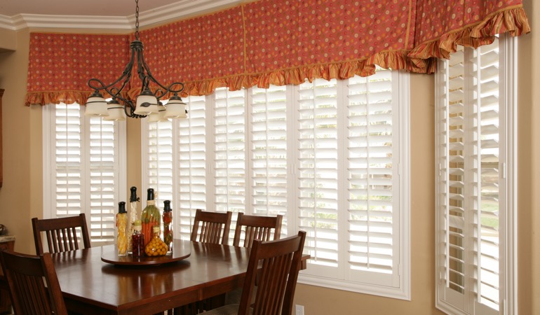 Decorative accents, drapes, and curtains may not reflect the simplicity you are going for. White shutters in Salt Lake City dining room.